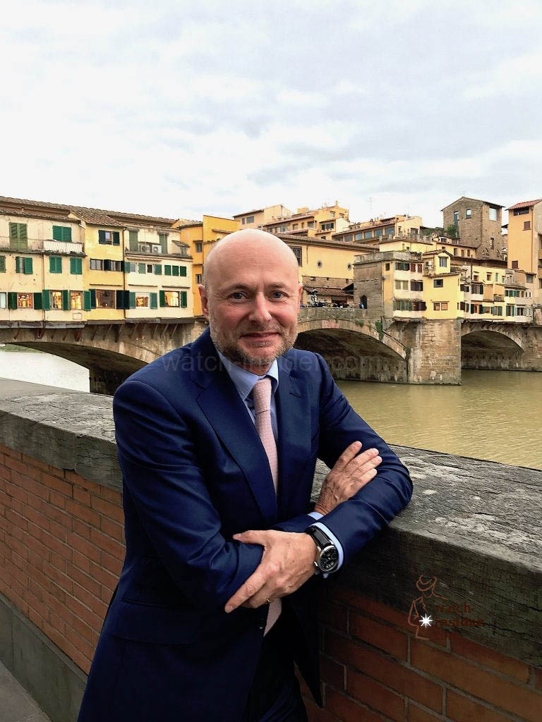 Georges Kern, CEO IWC Schaffhausen, standing in front of the famous Ponte Vecchio in Florence.
