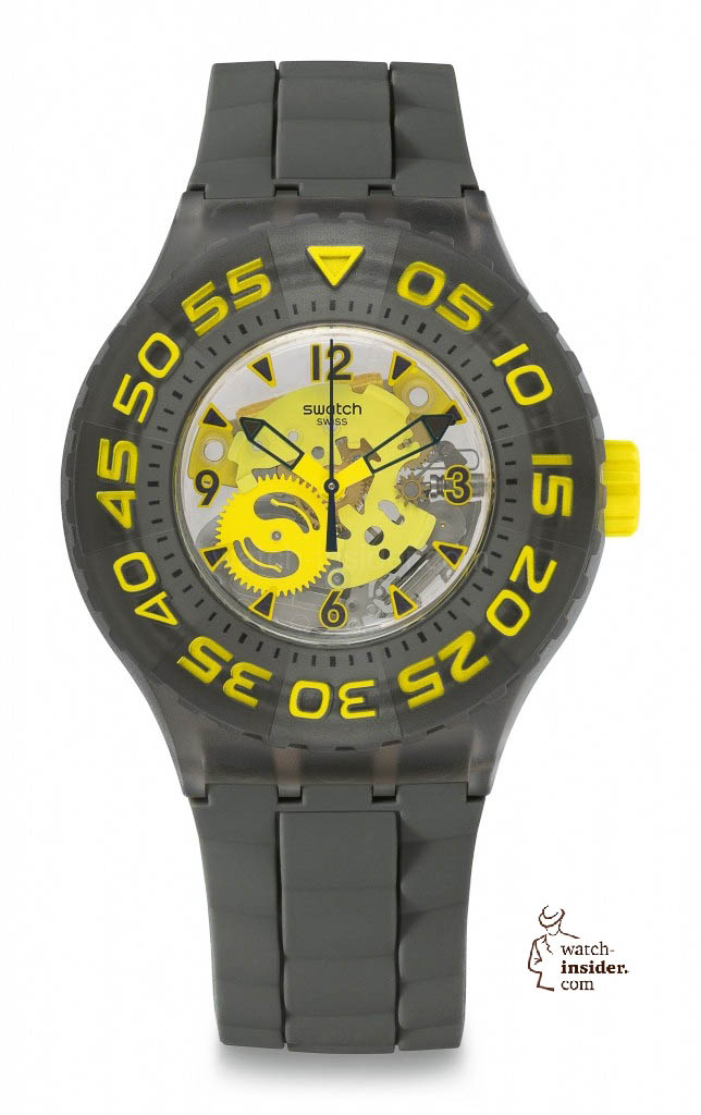 CUTTLEFISH Model: Scuba Libre Dial: transparent with yellow movement, dark blue and yellow indexes and blue Arabic numerals at 3, 6, 9 and 12  Case: transparent grey plastic, water-resistant 20 bar (200 m) Bezel: transparent grey plastic with dark blue indexes and yellow Arabic numerals, unidirectional rotation  Bracelet: solid grey silicone with yellow buckle and loop 